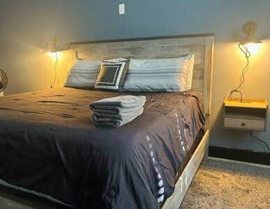 King size bed, full length mirror and dresser in each bedroom