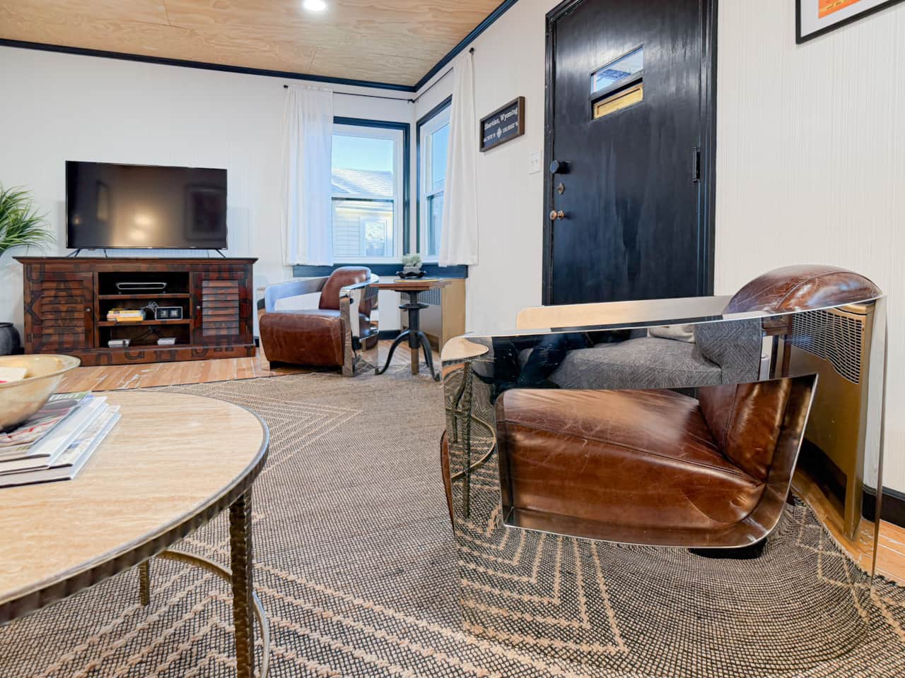 Spacious living room with smart entertainment setup.