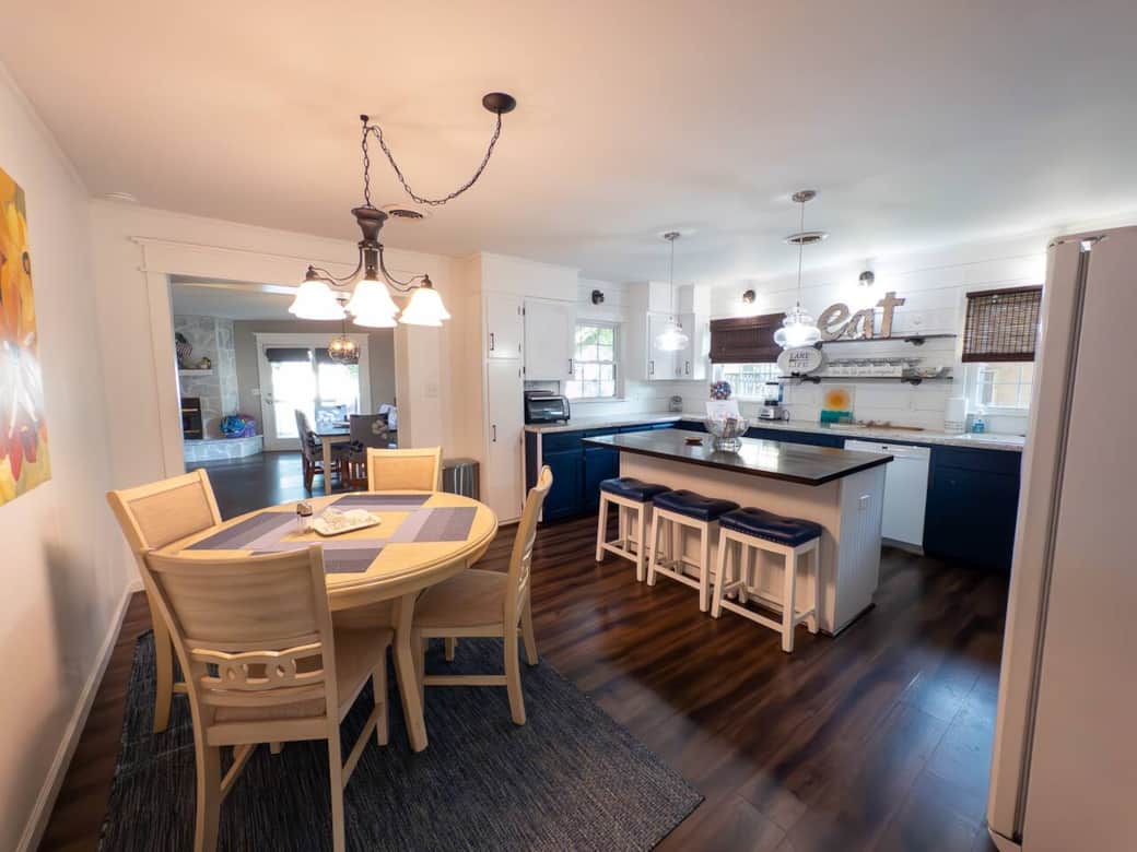 Alternate view of the eat-in kitchen, the round table and 3 stools add to the large dining room table to seat up to 13 people! Alternate view of the eat-in kitchen, the round table and 3 stools add to the large dining room table to seat up to 13 people!