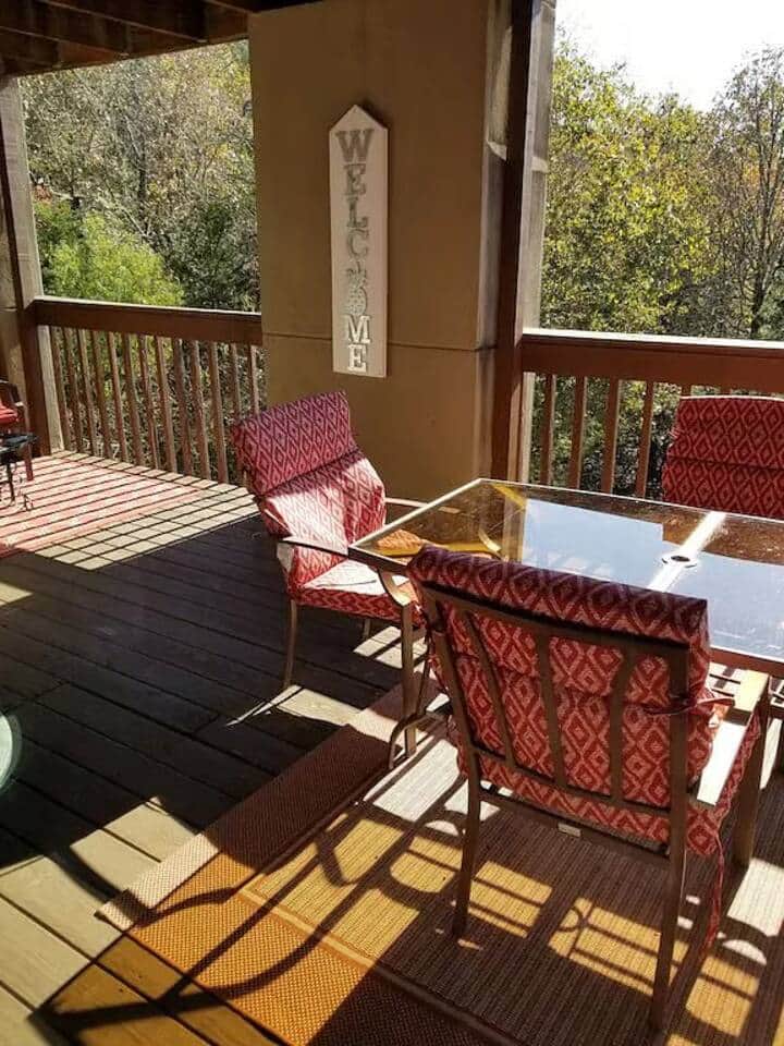 Comfortable outdoor seating on back deck.