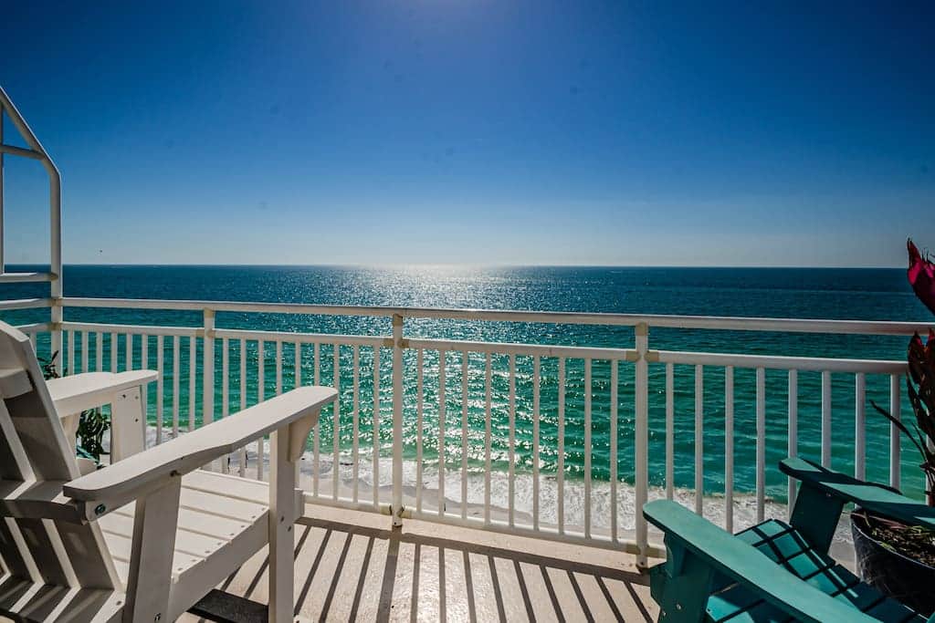 Private beachfront balcony off primary bedroom. Perfect place to watch the breathless sunsets. 
