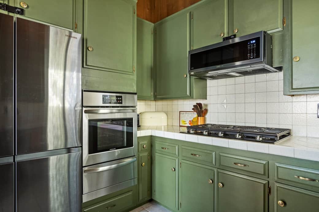 The kitchen has recently been updated with modern stainless steel appliances. The kitchen has recently been updated with modern stainless steel appliances.