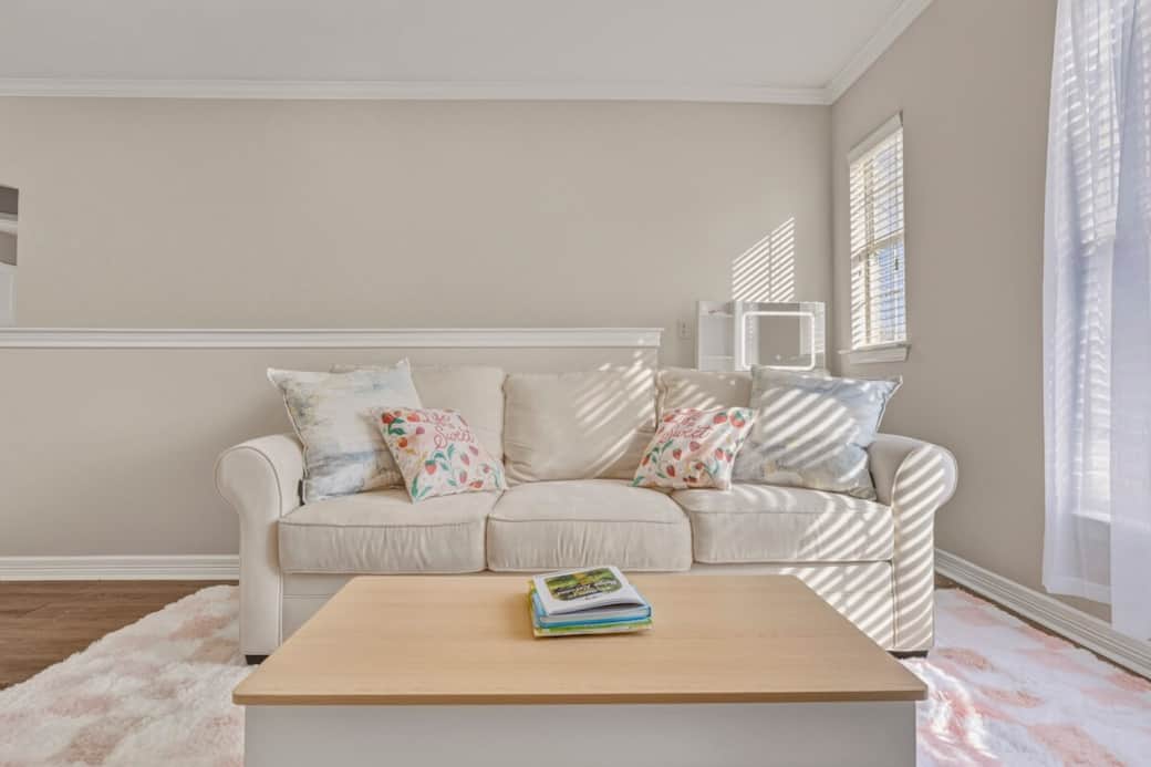 This cozy corner is ideal for relaxing, getting ready, or enjoying a nice quiet moment in the natural light. 