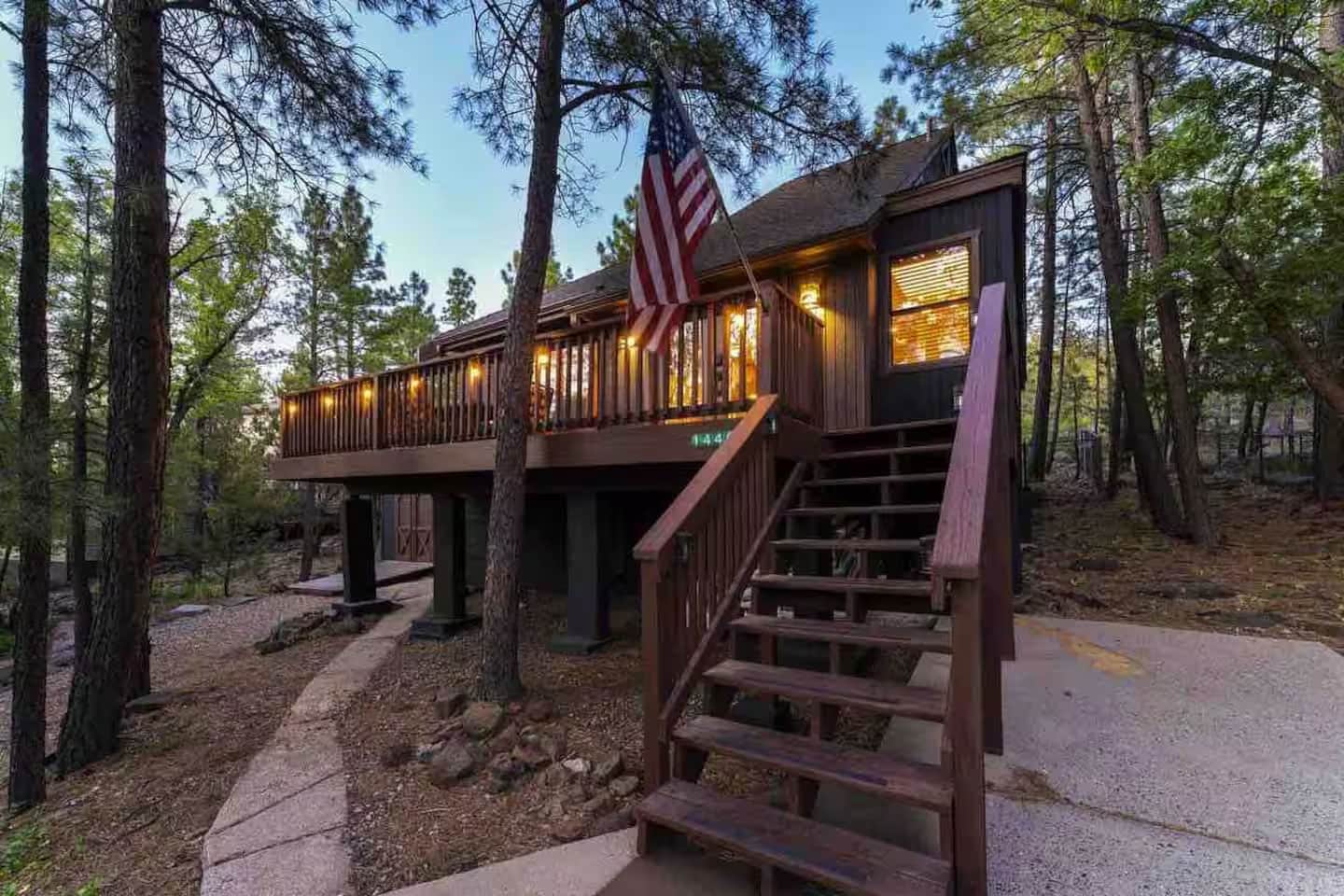 Front deck of mountain cabin at dusk in Munds Park