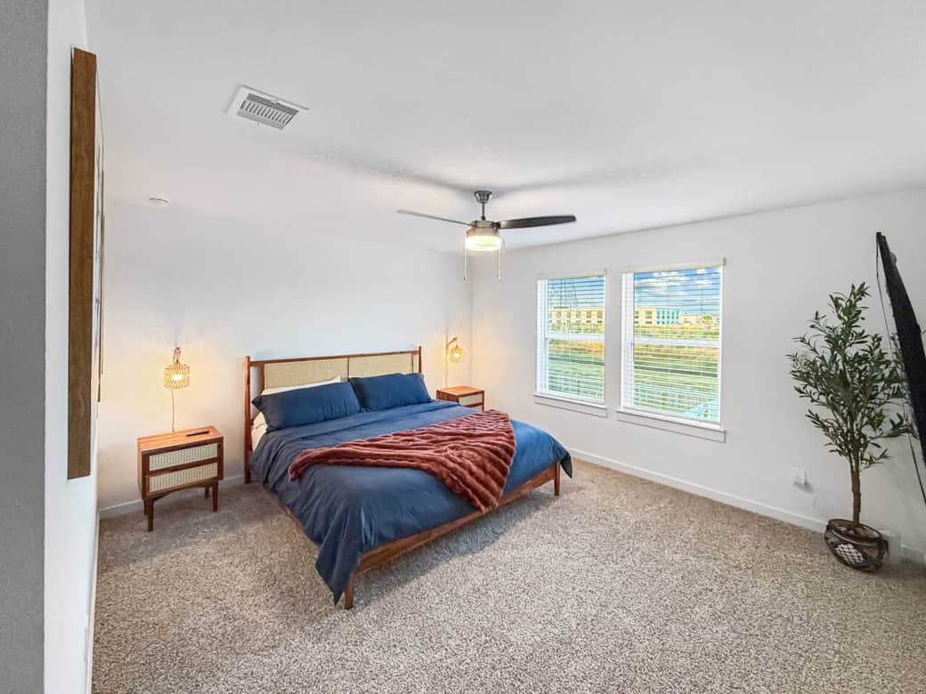 Sleep in comfort in this King Sized Bed with a 65 inch TV and the Houston Downtown Skyline to view. Enjoy the plush carpet on your feet.