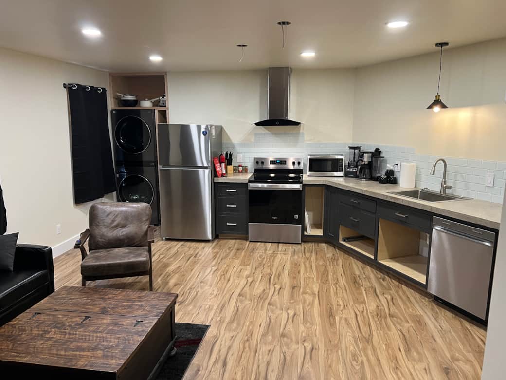 Looking at the end of the unit and the kitchen layout. More changes still coming.