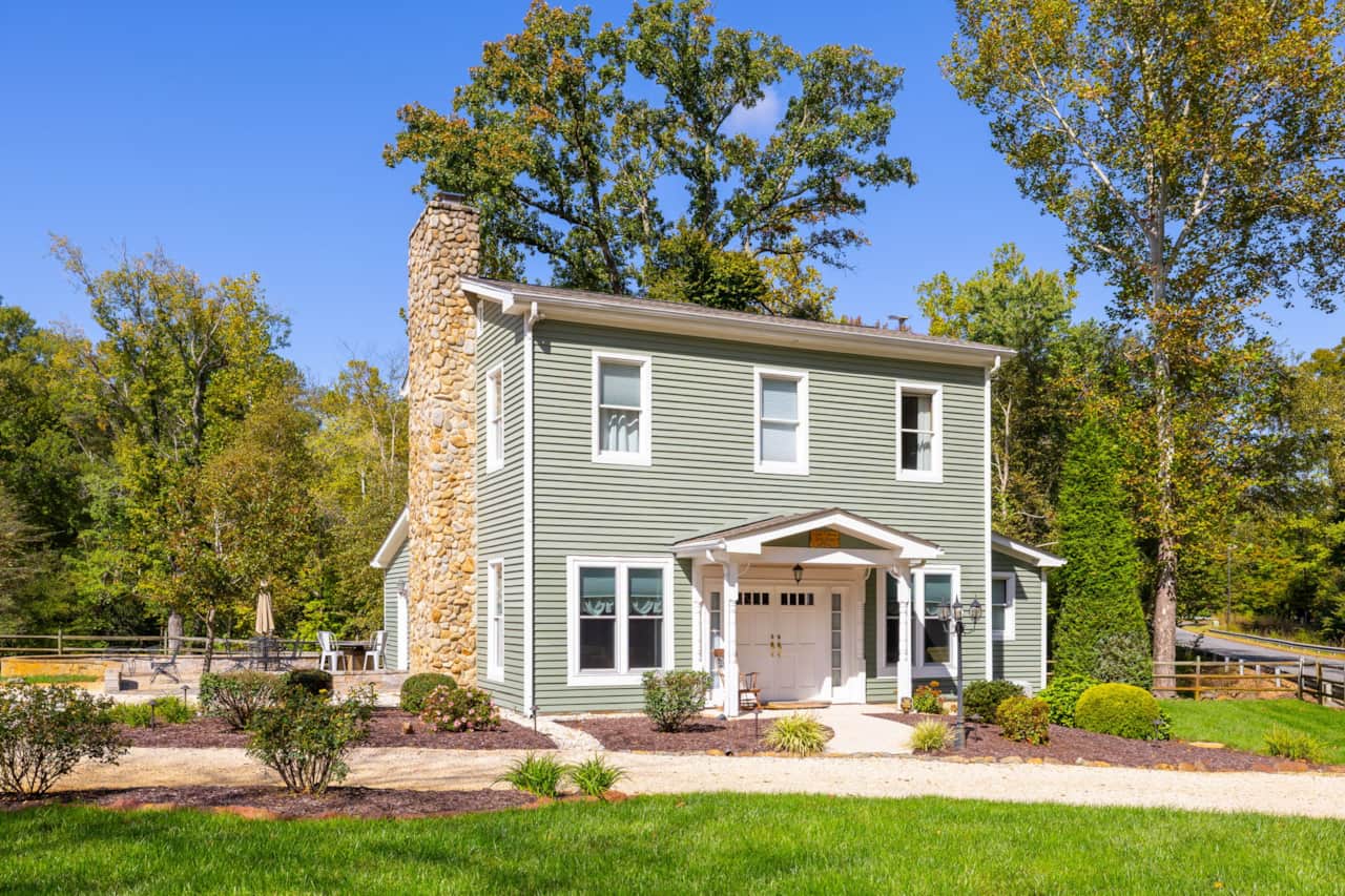 Millhouse front with side patio and entranceway