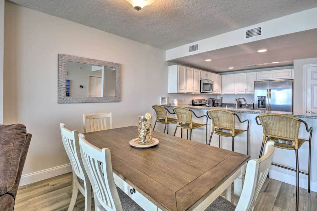  Seating for six at the dining table and four barstools at breakfast counter for additional seating.