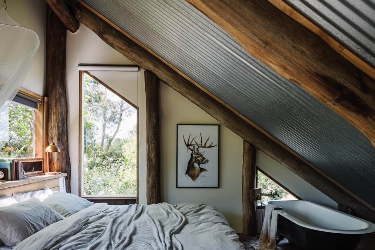 Otways Loft second storey bedroom with hand crafted timber detail, Forrest VIC