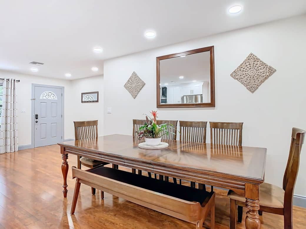 Large dining table sits up to ten people. High chair is available upon request