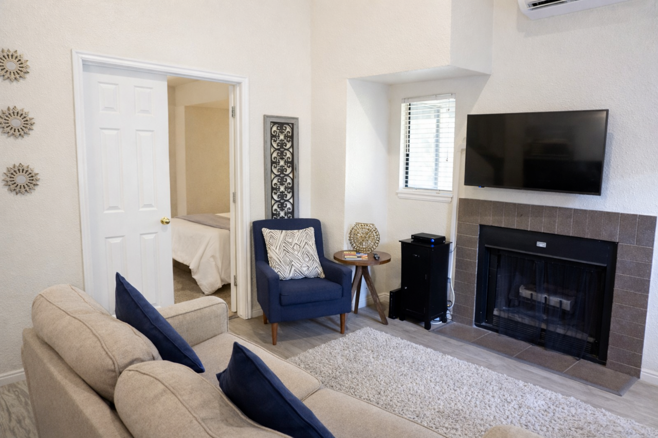 Snuggle up by the real fireplace! Just bring your own firewood and you’re all set.
