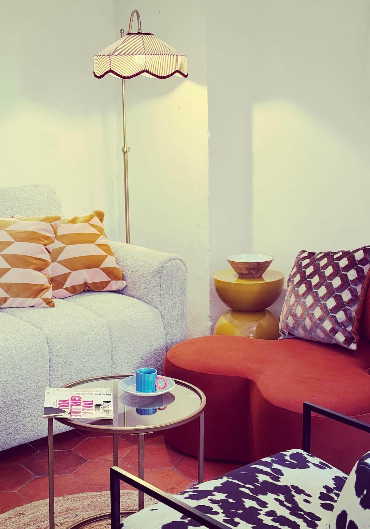 Living room — the perfect place to curl up in an armchair with a good book.