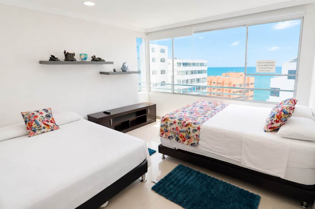 Habitación con dos camas dobles