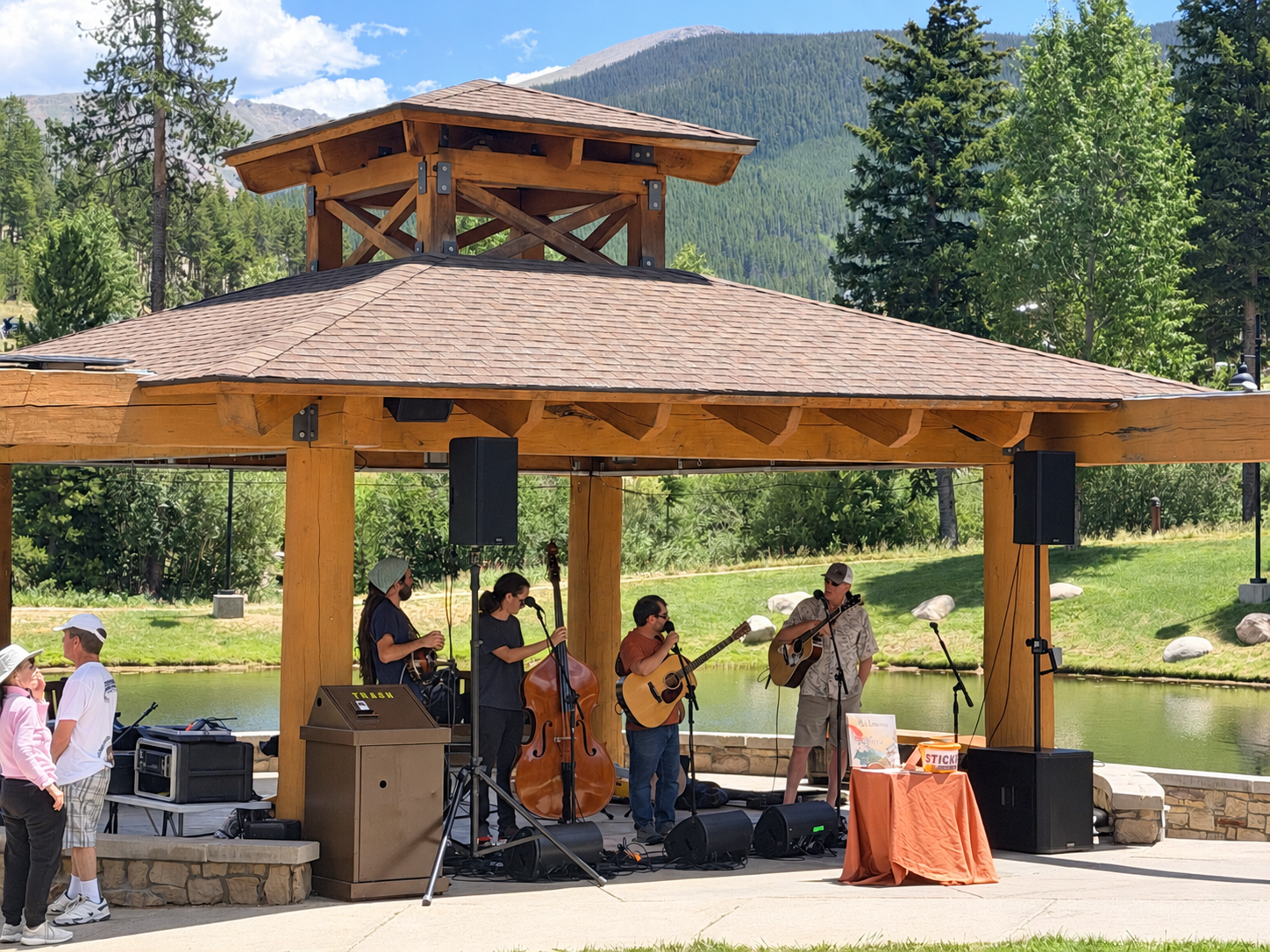 Musicians playing in an outdoor gazebo in the resort village