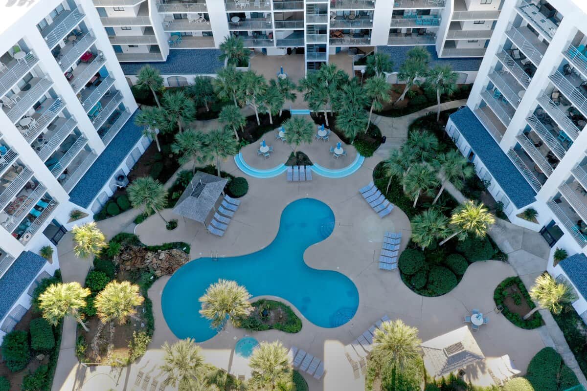 Relax under the palms next to our resort-style pool.