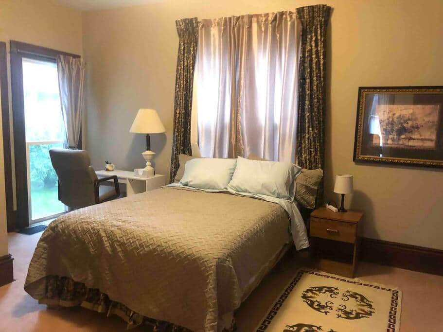 Bedroom with Queen  size bed, 2 large closets and a desk.