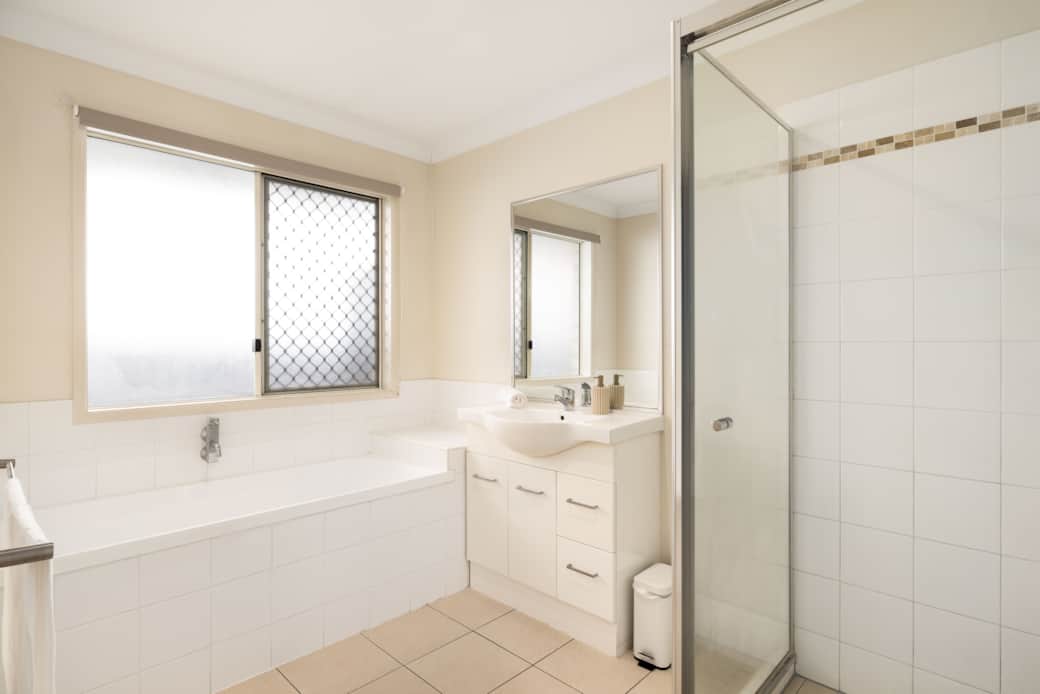 Bathroom: Clean, well-kept bathroom with bathtub included