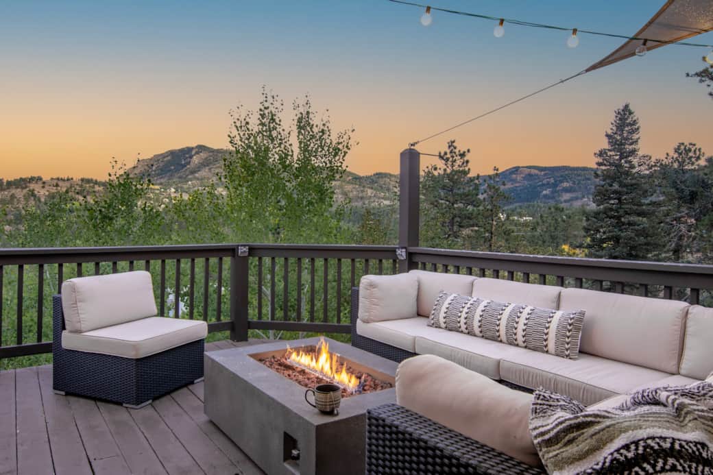 Soak in sunset mountain views around the natural gas firepit on the wrap around deck!