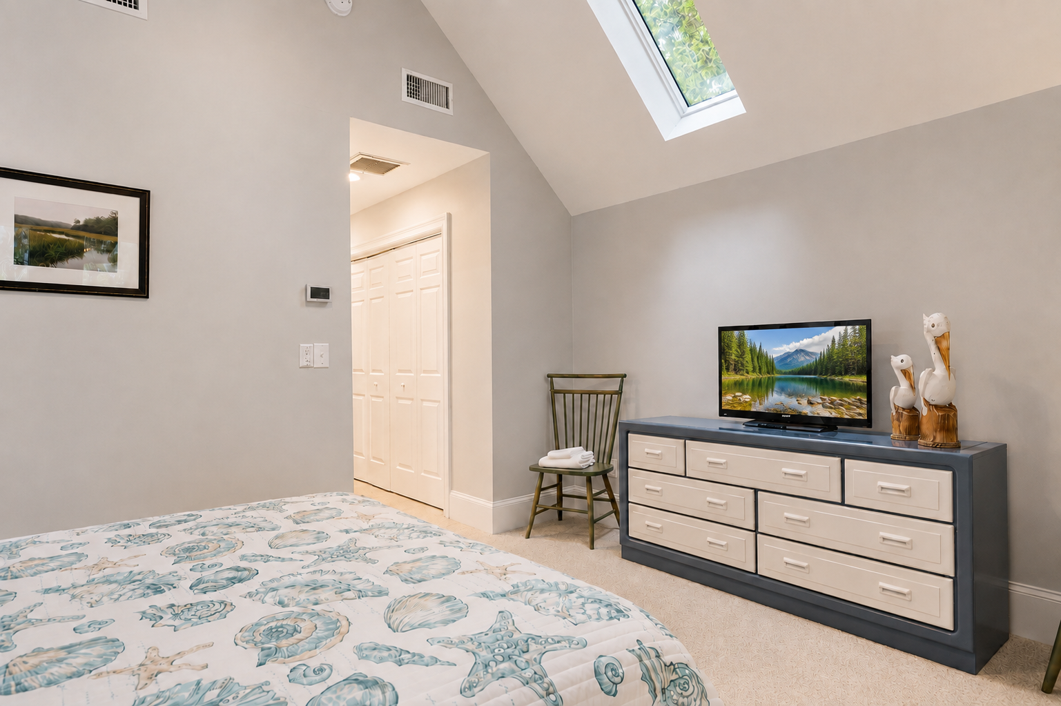 Unpack into the dresser and unwind with a show under the open skylight.