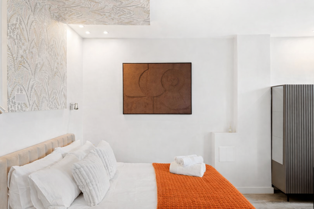 A calm, beautifully styled bedroom featuring a plush double bed with premium linens A calm, beautifully styled bedroom featuring a plush double bed with premium linens