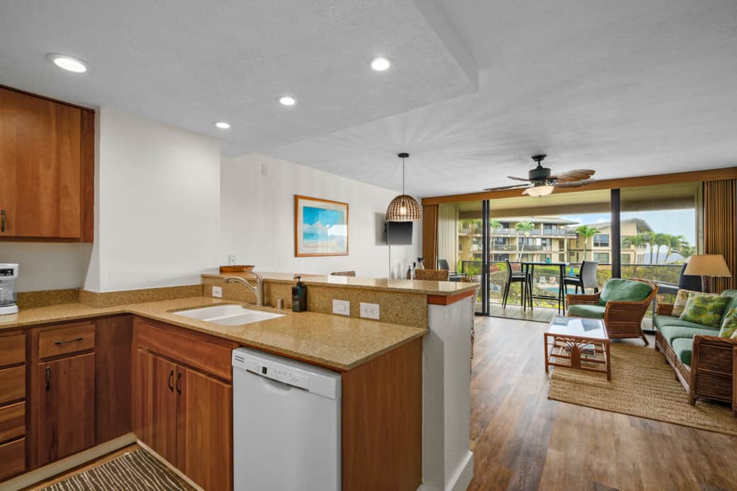 Open kitchen flows to lanai—cook, dine, and soak in ocean views