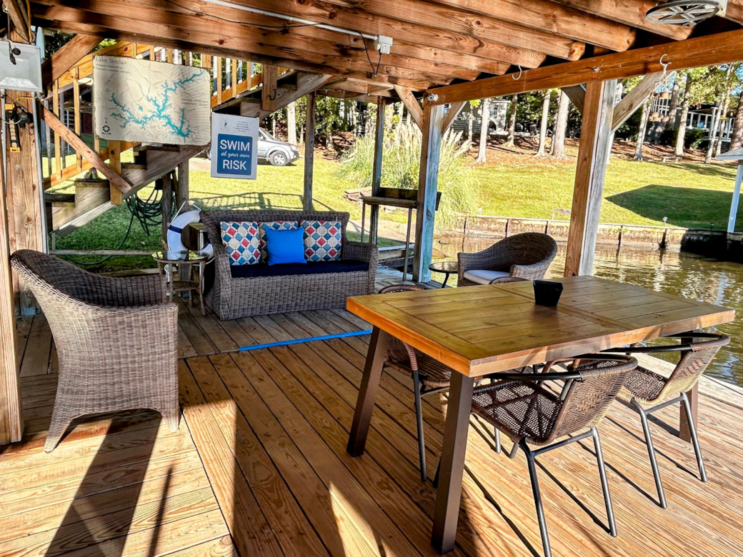 Covered outdoor living and dining view 1