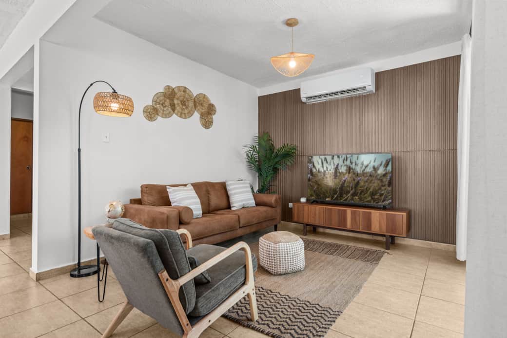 Bright, airy living room with bamboo accents and open layout