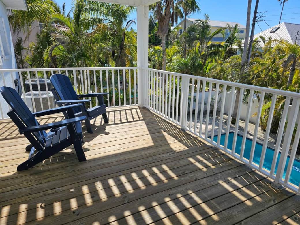 Master bedroom deck with view to the pool