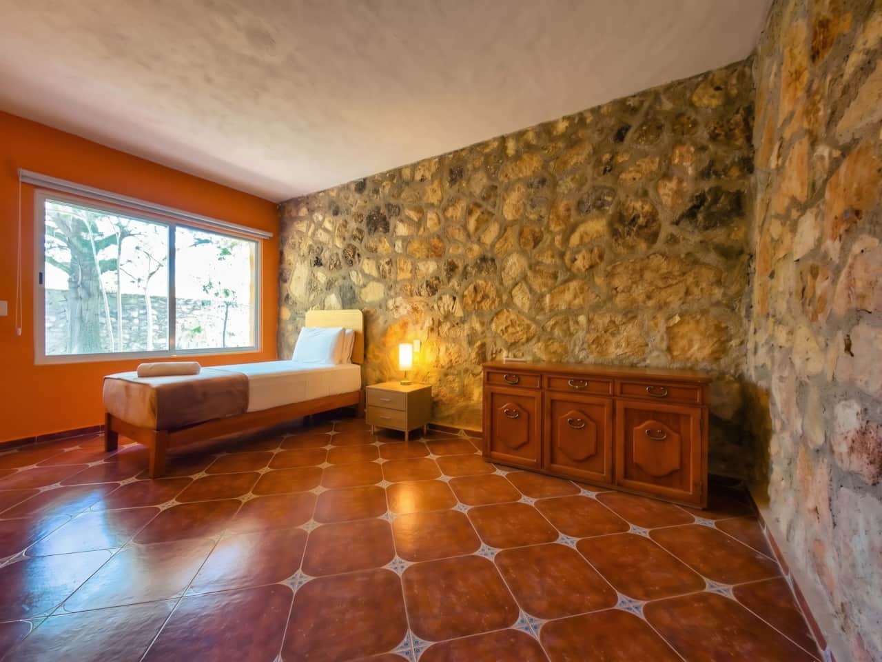 Room with single bed.