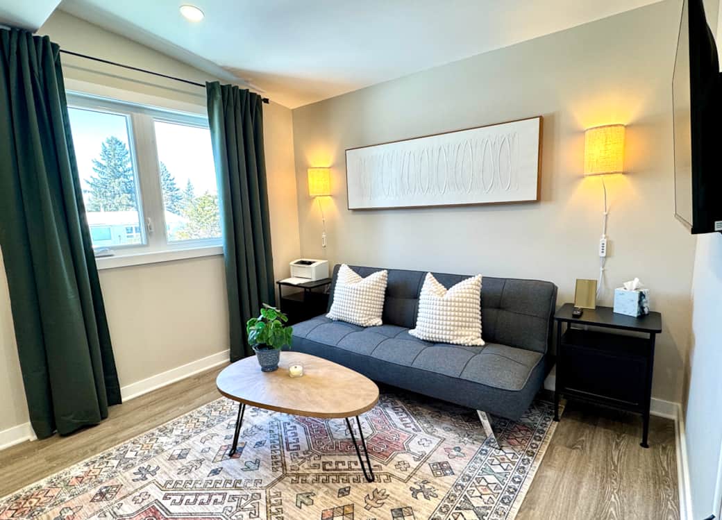 Dedicated sunlit workspace for remote work in an Ottawa suite. Dedicated sunlit workspace for remote work in an Ottawa suite.