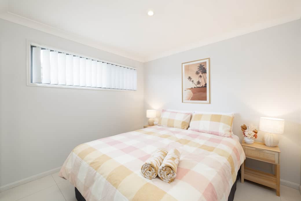 Bedroom 1: Peaceful bedroom with cozy design and ample storage