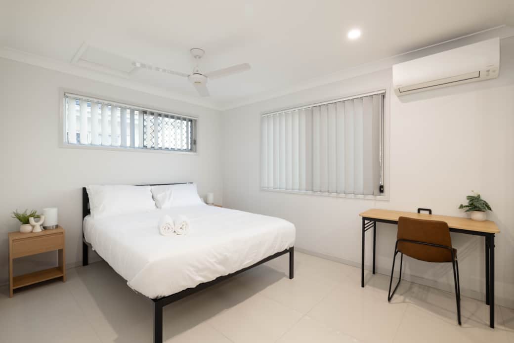 Bedroom: Peaceful bedroom with cozy design and ample storage 