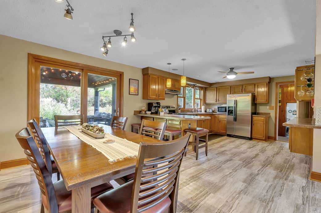 Fully connected kitchen, dining, and living spaces designed for easy group stays. Fully connected kitchen, dining, and living spaces designed for easy group stays.