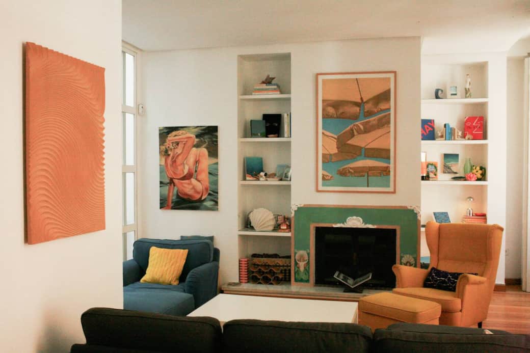 No need to turn on any overhead lights in the living room because the natural light will trickle in from both the interior patio and the 3 balconies to the street. A great spot for hanging out for larger groups.