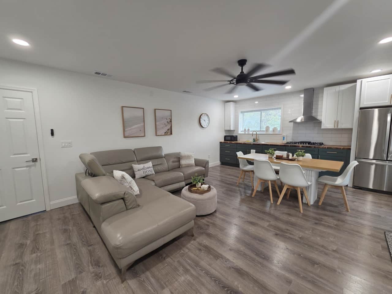 Bright living area near dining room with ceiling fan. Lakeland, FL