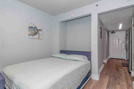 Comfy Pull-down murphy bed with foam mattress topper!