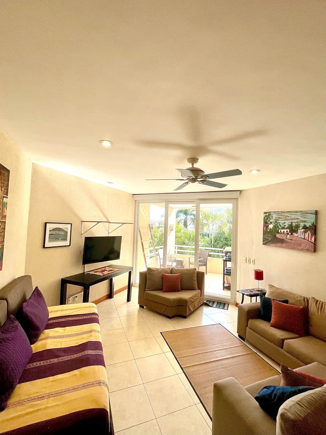 Living room area with sliding doors to patio. 