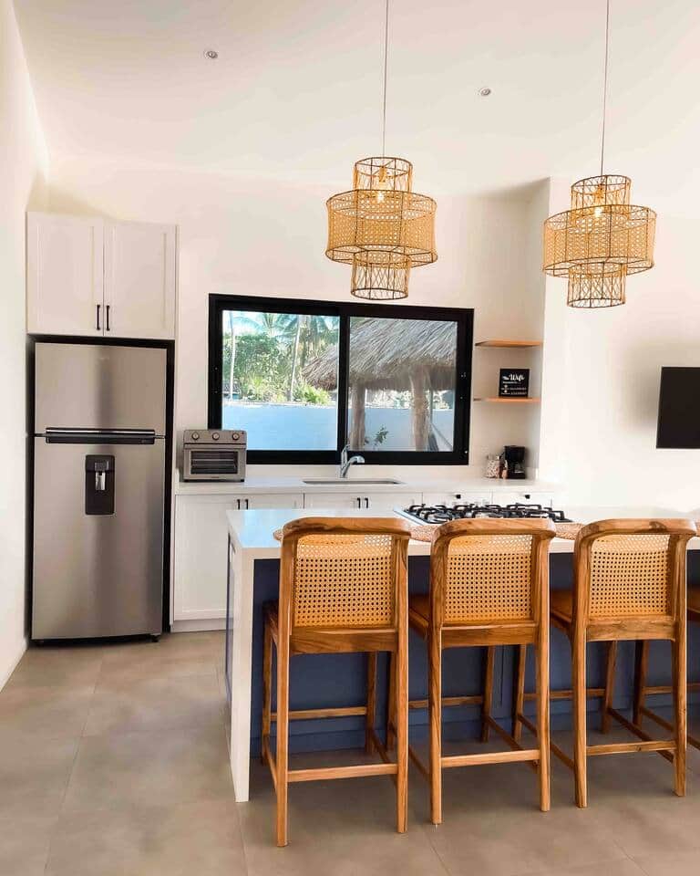 Fridge, toaster oven, extra large sink, coffee maker.