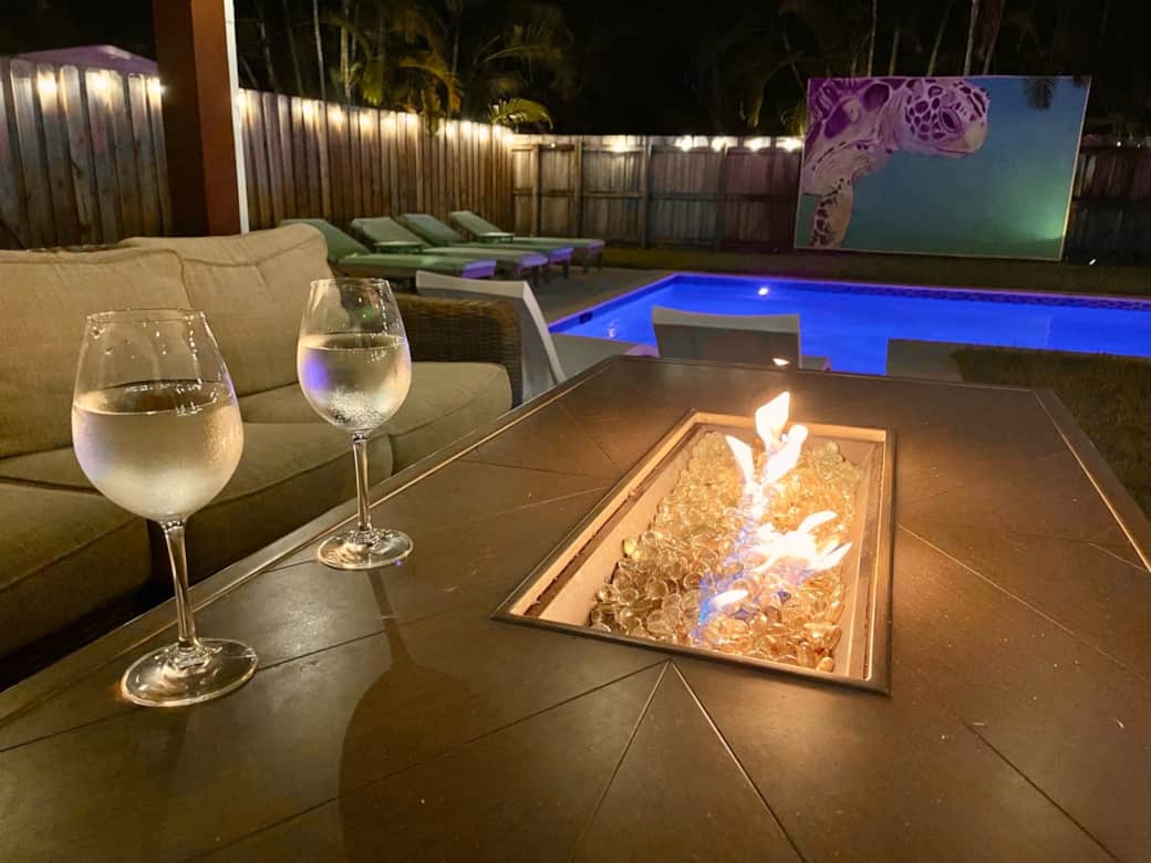Fire pit over looking Pool/Outdoor Living Space at night