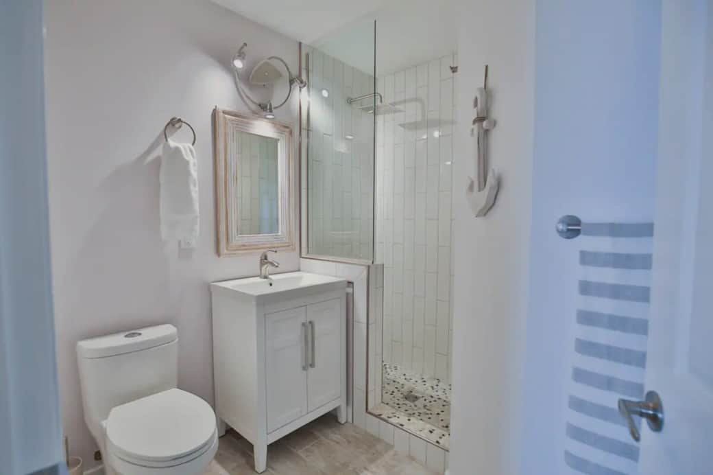 Bathroom with tile rain shower & heated floors