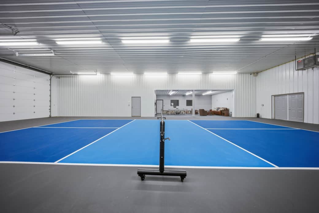 Private heated pickleball court with spectator lounge, just steps from the lodge.