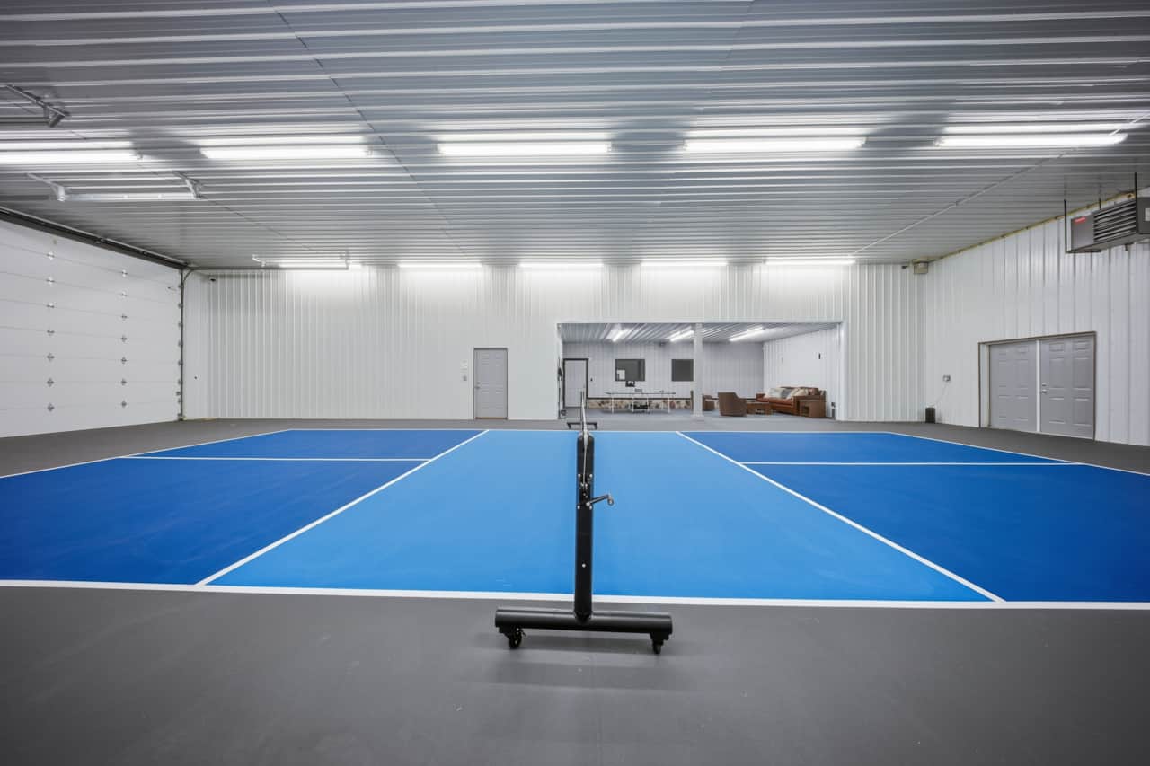 Private heated pickleball court with spectator lounge, just steps from the lodge.