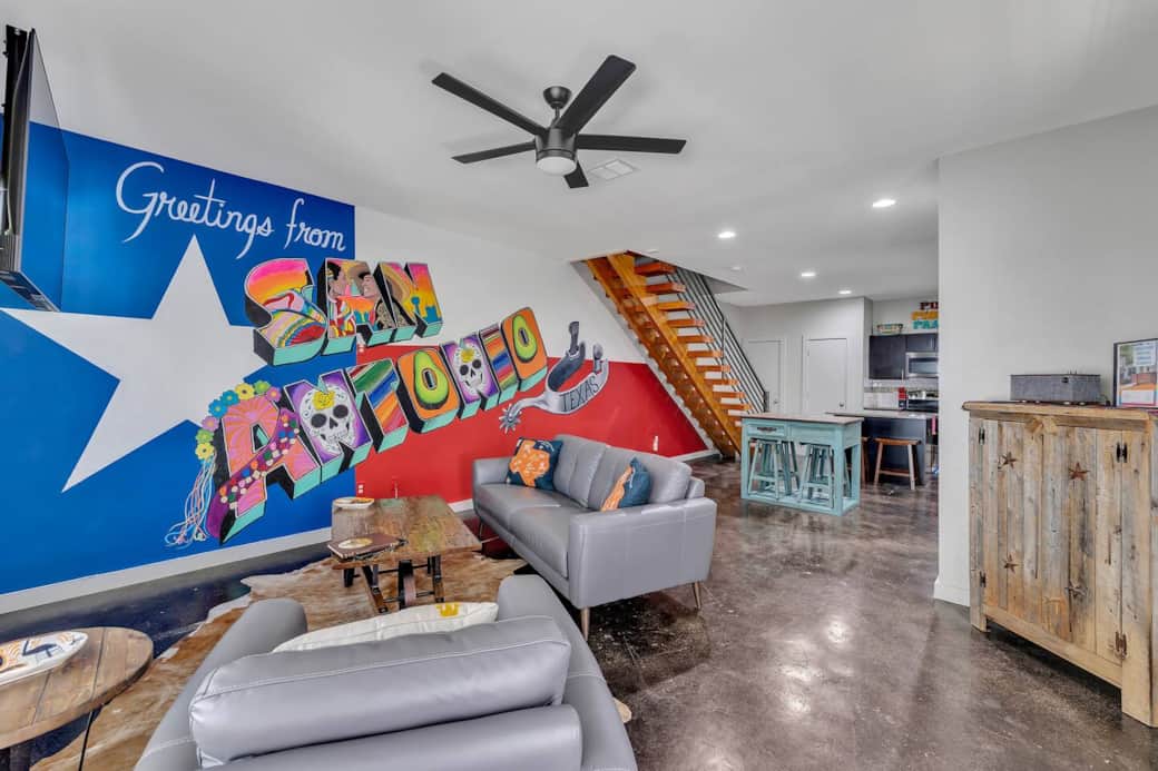 A custom-commissioned mural by local street artist GHOST covers the entire wall of the living room! It is a one-of-kind and perfect picture opportunity for you.