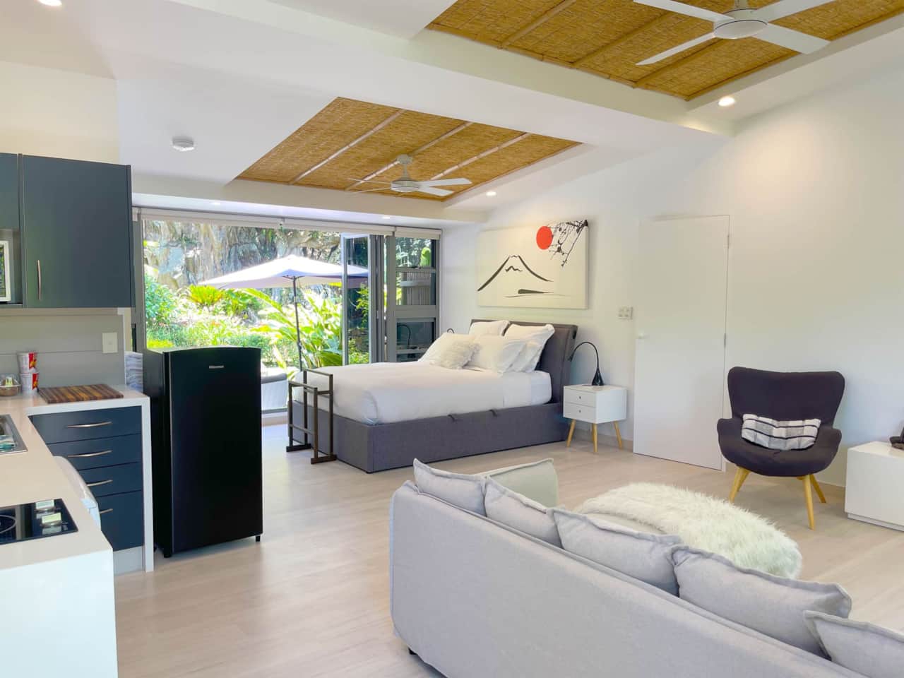 Zen Garden Suite kitchenette and queen bedroom