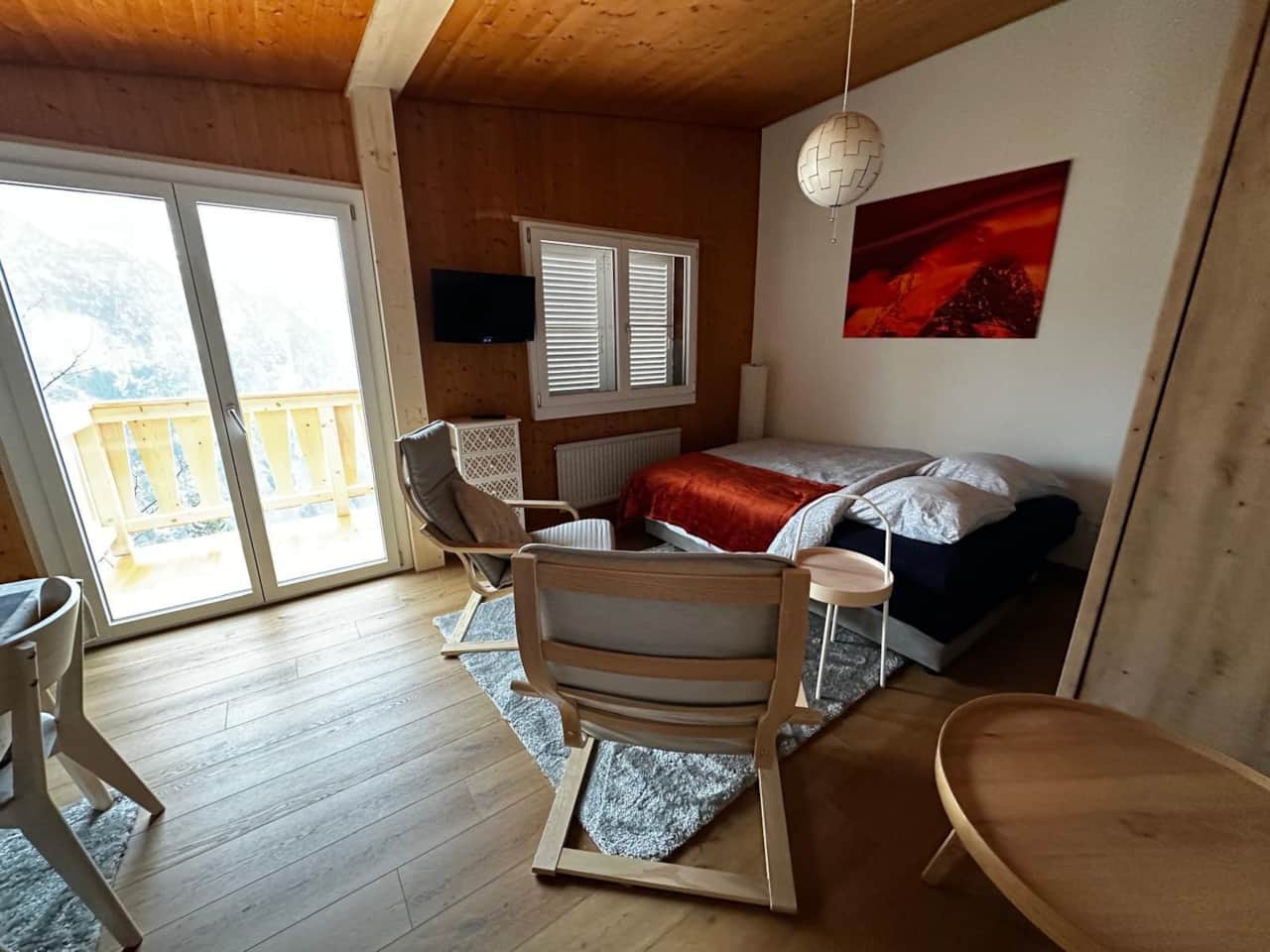 Living Room with a Sleeping Couch with Mountain View