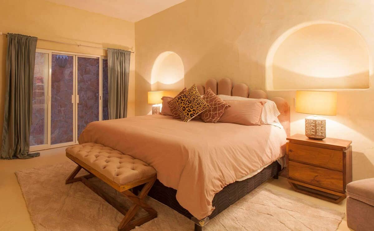 Bedroom with outdoor terrace. Large king size bed.  