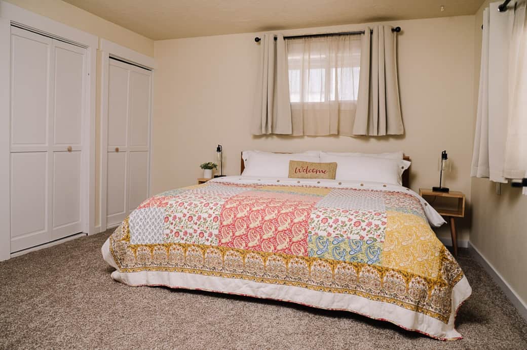 King size bed and massage chair in bedroom 