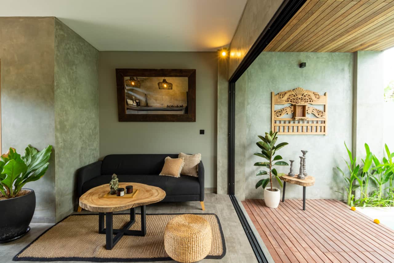 Our apartment combines the element of modern industrial with natural island decor