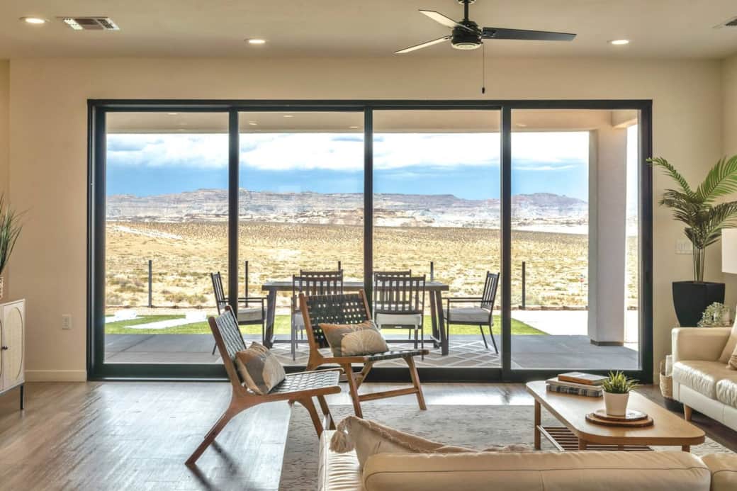 Unobstructed views from the open concept living room. Giant slider window that opens up for perfect indoor outdoor living. Chic modern design with seating for large groups. Watch the nightly pink, purple and orange sunsets from the hot tub. Unobstructed views from the open concept living room. Giant slider window that opens up for perfect indoor outdoor living. Chic modern design with seating for large groups. Watch the nightly pink, purple and orange sunsets from the hot tub.