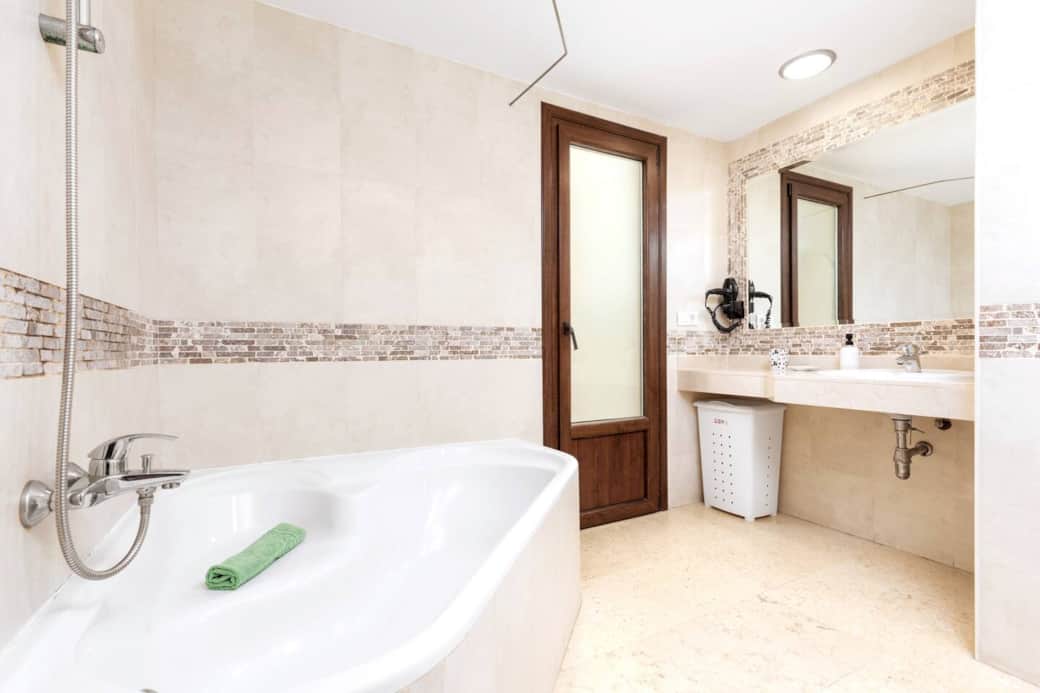 Bathroom comfortably shared between 2 lower floorBedrooms. With Large corner bath / shower and fitted hairdryer Bathroom comfortably shared between 2 lower floorBedrooms. With Large corner bath / shower and fitted hairdryer